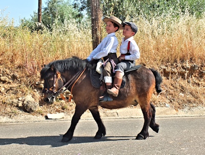 two lads on a donkey